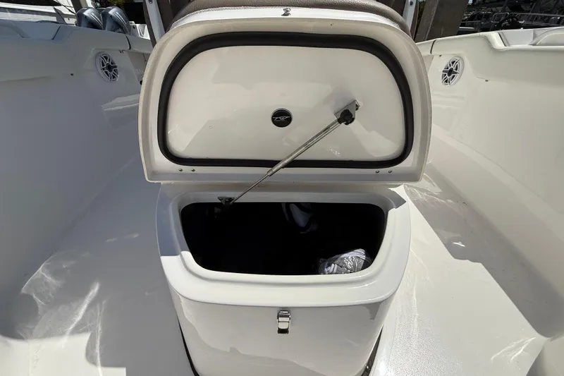 Slide: The Image of Open storage compartment on 2025 Tidewater 272 CC Adventure boat. - 26