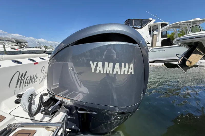 Slide: The Image of 2025 Tidewater 272 CC Adventure boat with Yamaha engine at marina. - 46