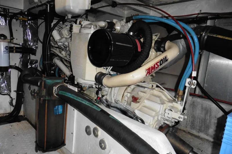 Slide: The Image of Engine room of 2000 Bayliner 3988 Command Bridge Motoryacht with AMSOIL components. - 23