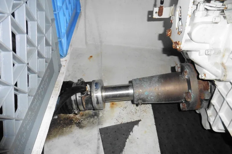 Slide: The Image of Engine compartment of 2000 Bayliner 3988 Command Bridge Motoryacht, showing shaft and mechanical components. - 25