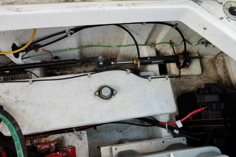 Slide: The Image of Engine compartment of a 2000 Bayliner 3988 Command Bridge Motoryacht, showing wiring and components. - 42