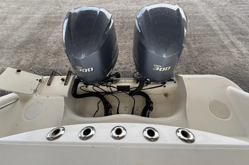 Slide: The Image of 2004 Boston Whaler 320 Outrage with twin Yamaha 300 engines, rear view. - 14