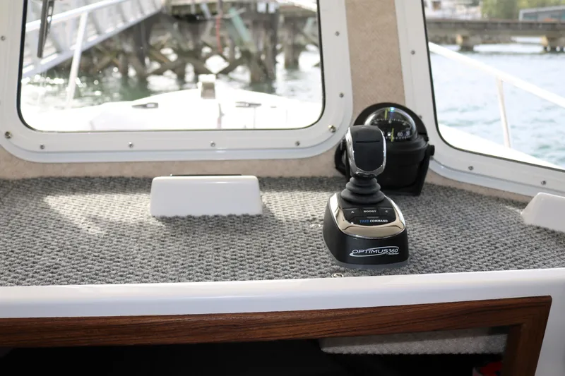 Slide: The Image of Interior view of 2026 SeaSport Aleutian 2600 boat with Optimus 360 control system. - 26