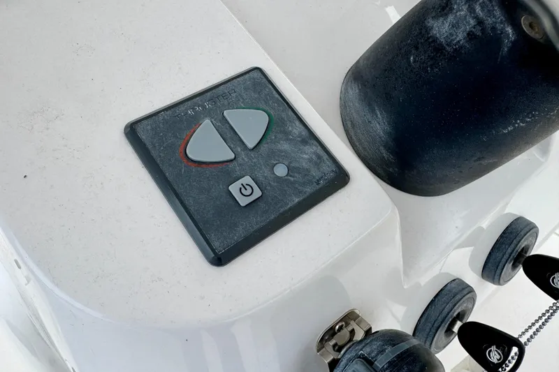 Slide: The Image of Control panel on a 2013 Intrepid 300 Center Console boat deck. - 19
