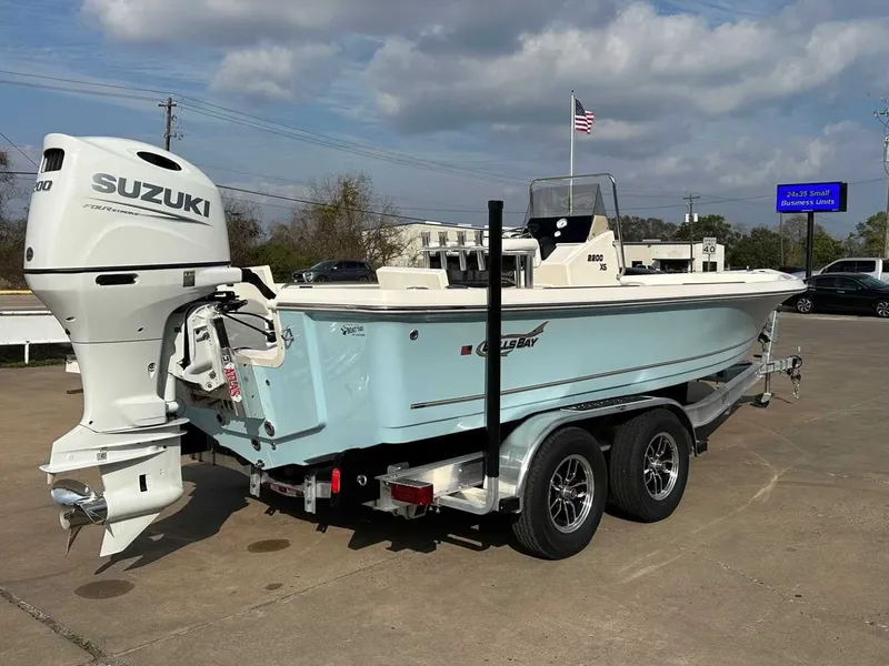 Slide: The Image of 2026 Bulls Bay 2200 XS boat with Suzuki engine on trailer. - 11