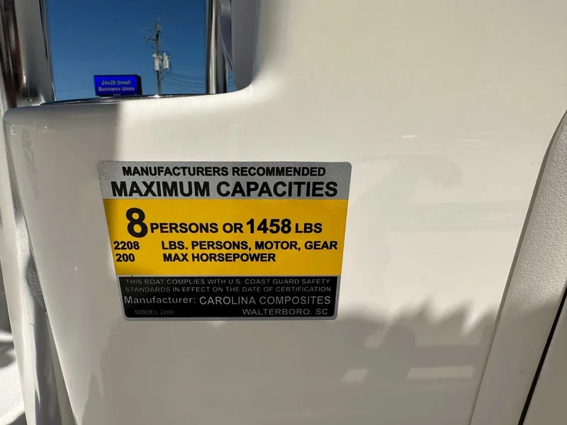 Slide: The Image of Bulls Bay 2200 XS 2026 boat capacity label, max 8 persons or 1458 lbs. - 22