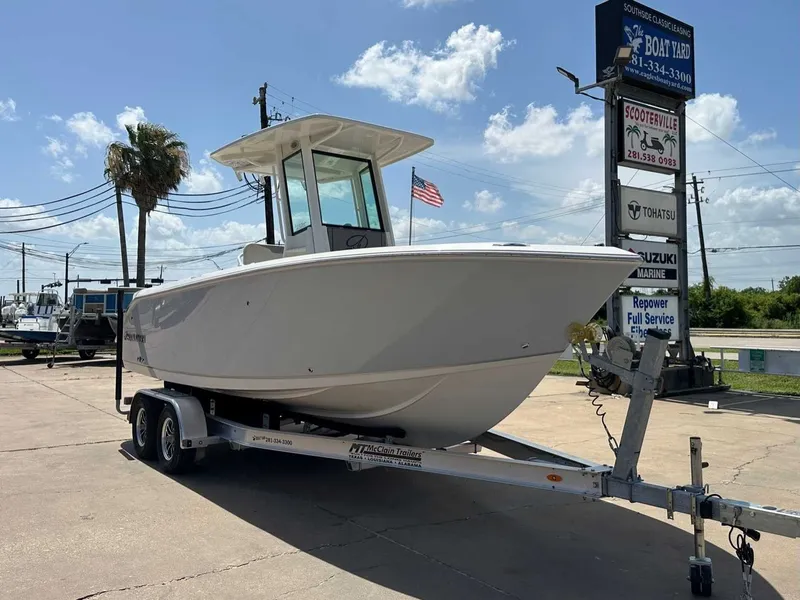 Slide: The Image of 2026 Sailfish 232 CC boat on trailer outdoors. - 10