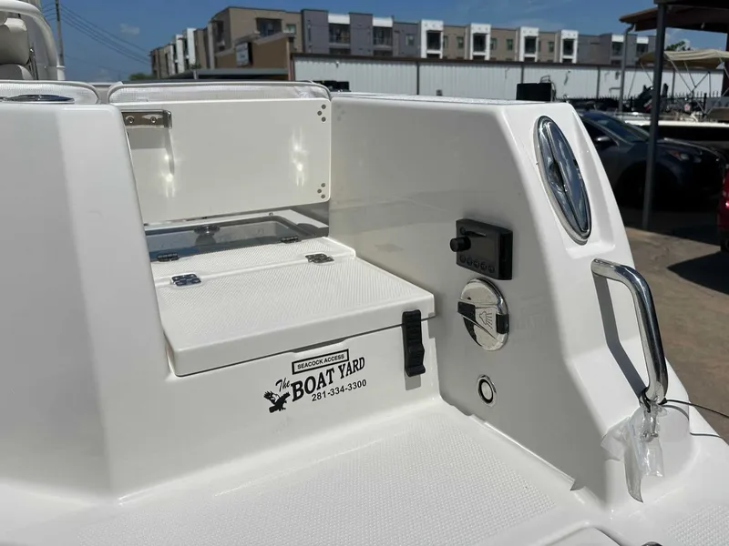 Slide: The Image of Sailfish 232 CC 2026 boat, detailed view of cockpit area outdoors. - 13