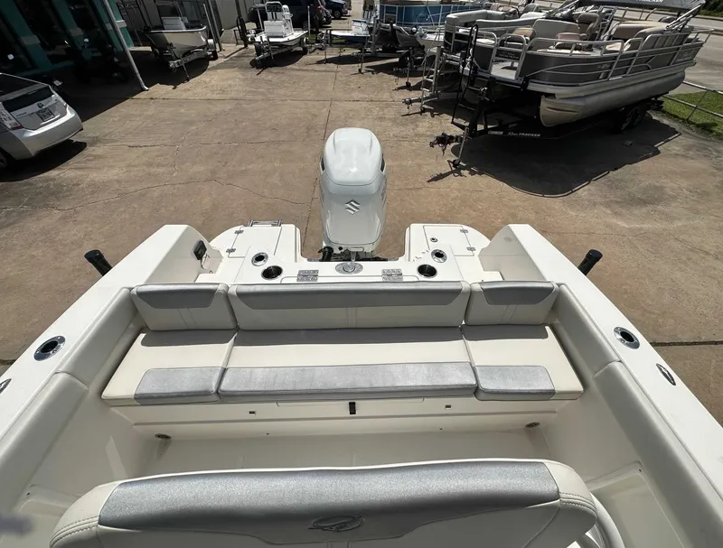 Slide: The Image of 2026 Sailfish 232 CC boat with Suzuki outboard motor. - 14