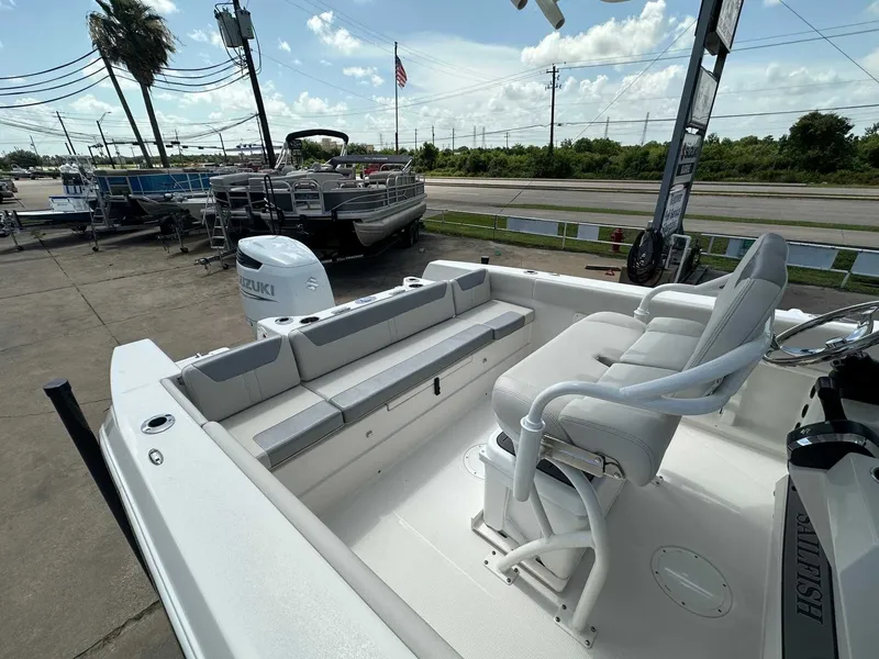 Slide: The Image of Interior view of 2026 Sailfish 232 CC boat at dock. - 16
