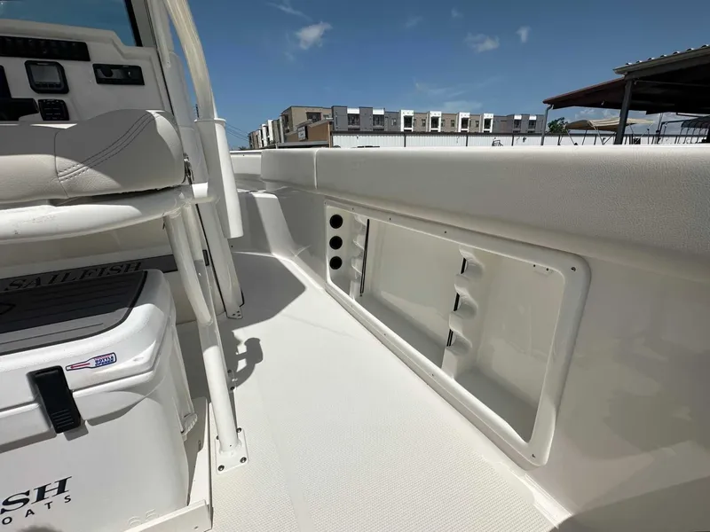Slide: The Image of Interior view of 2026 Sailfish 232 CC boat with storage area. - 24
