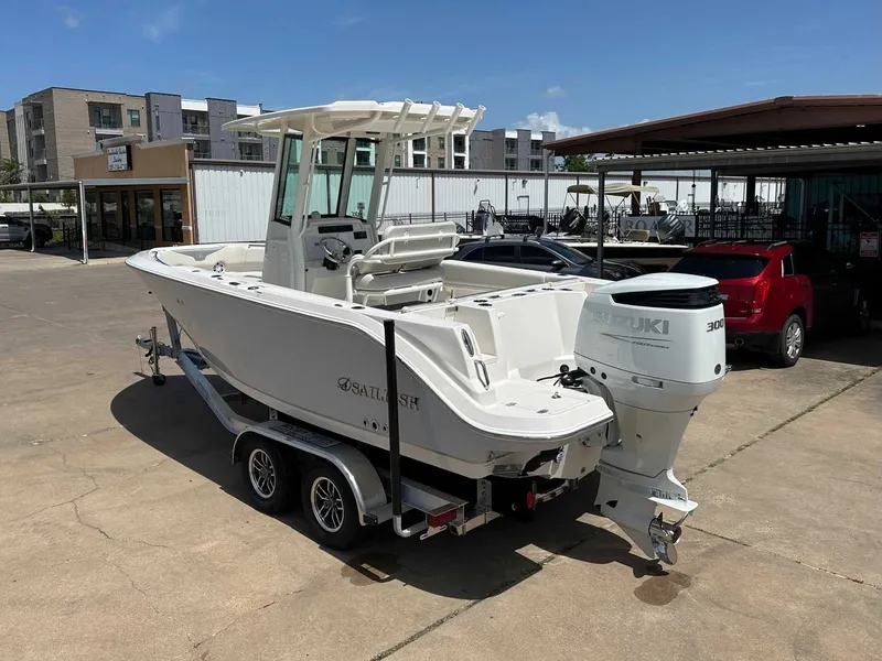 Slide: The Image of 2026 Sailfish 232 CC boat with Suzuki 300 engine on trailer. - 3