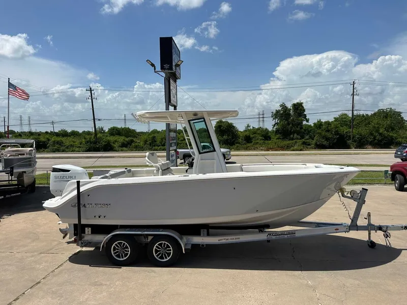 Slide: The Image of 2026 Sailfish 232 CC boat on trailer in sunny weather. - 6
