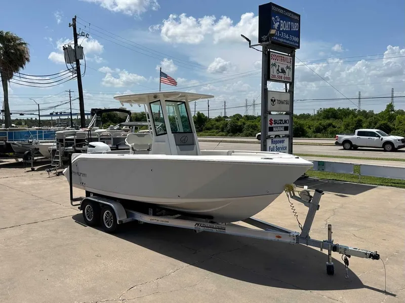 Slide: The Image of 2026 Sailfish 232 CC boat on trailer in sunny weather. - 7