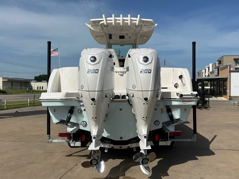 Slide: The Image of 2026 Sailfish 272 CC with dual outboard engines. - 12