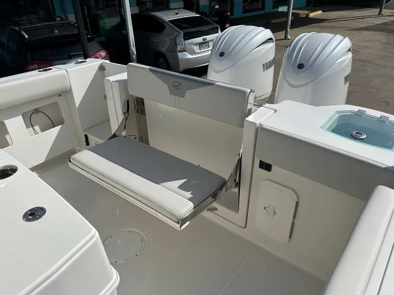 Slide: The Image of Interior view of 2026 Sailfish 272 CC boat with bench seat. - 17