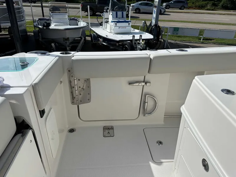 Slide: The Image of Interior of Sailfish 272 CC 2026 with white upholstery. - 18