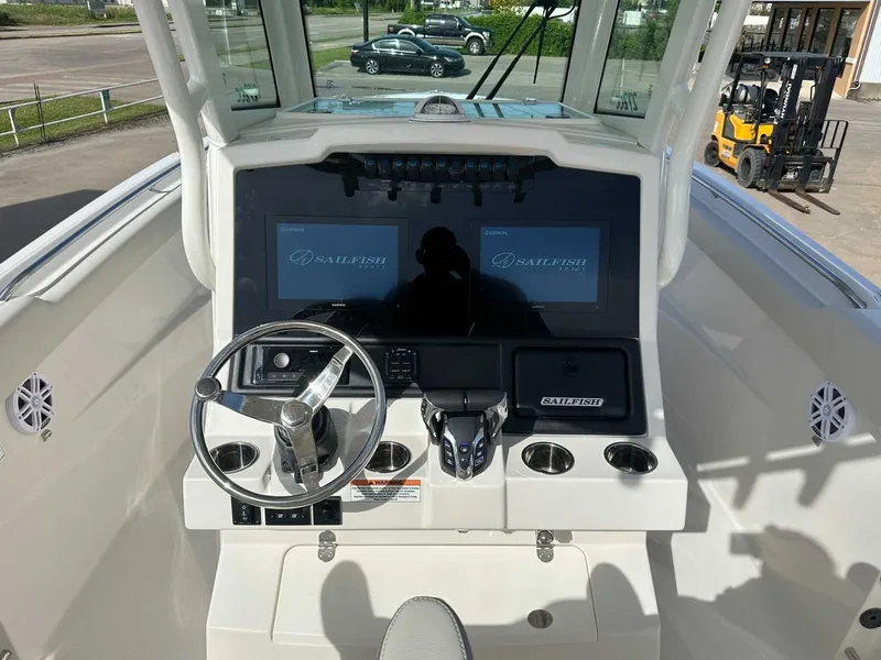 Slide: The Image of Sailfish 272 CC boat helm console, model year 2026. - 24