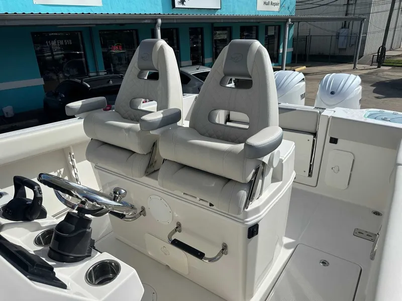 Slide: The Image of Interior of 2026 Sailfish 272 CC featuring luxurious seating. - 25