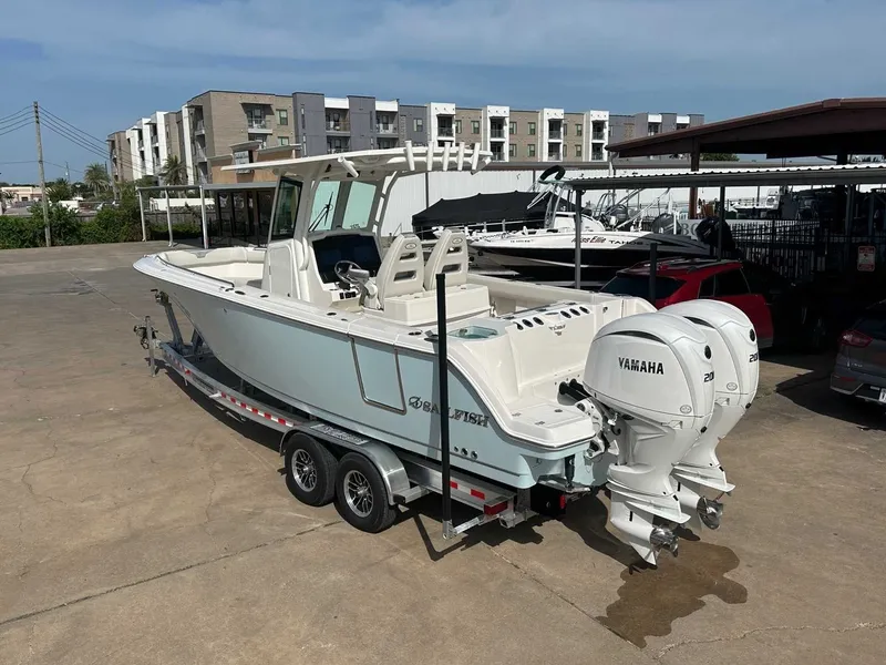 Slide: The Image of 2026 Sailfish 272 CC boat with Yamaha engines on trailer. - 3