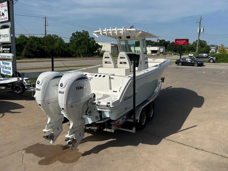 Slide: The Image of 2026 Sailfish 272 CC boat with Yamaha engines on trailer. - 5