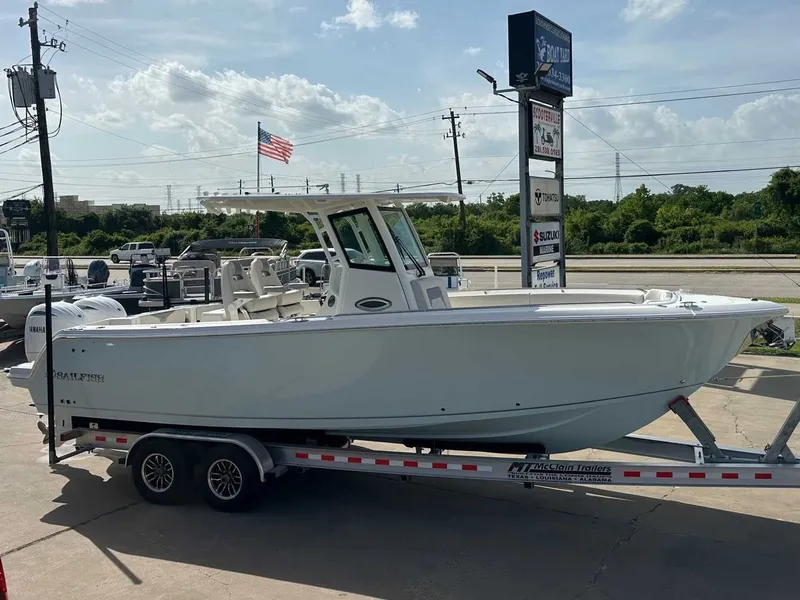 Slide: The Image of 2026 Sailfish 272 CC boat on trailer outdoors. - 6
