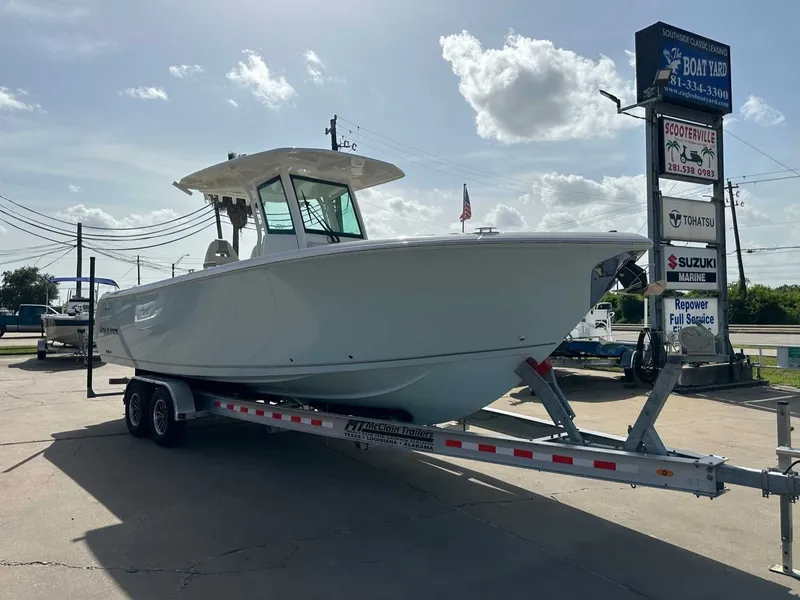 Slide: The Image of 2026 Sailfish 272 CC boat on trailer in sunny weather. - 8