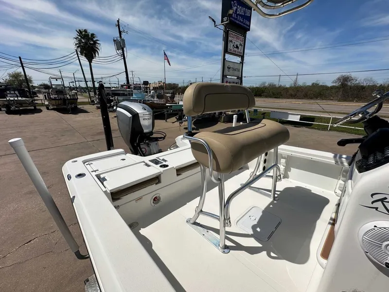 Slide: The Image of 2019 NauticStar 227XTS boat with outboard motor on a lot. - 20