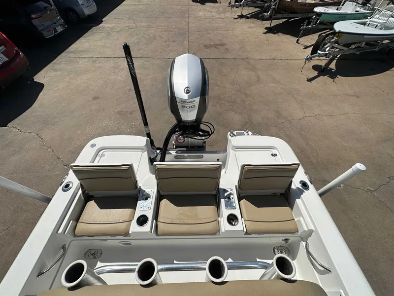 Slide: The Image of Rear view of a 2019 NauticStar 227XTS boat with engine. - 22