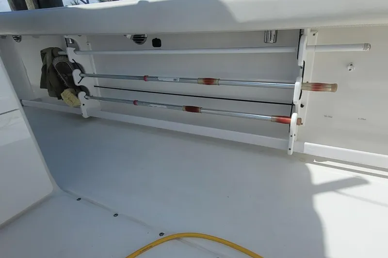 Slide: The Image of Cockpit of 2009 Everglades 350 Center Console boat with navigation equipment. - 12