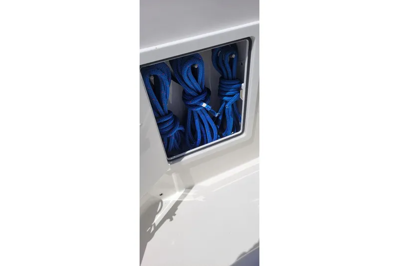 Slide: The Image of 2009 Everglades 350 Center Console boat bathroom with sink and toilet. - 17