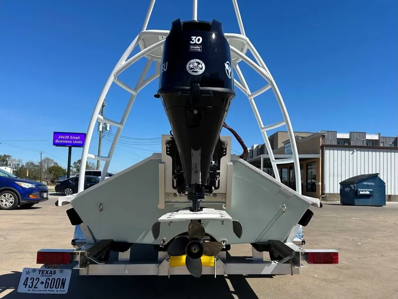 Slide: The Image of B & D Boat Works Wasp 178 Tiller 2026 with outboard motor. - 10