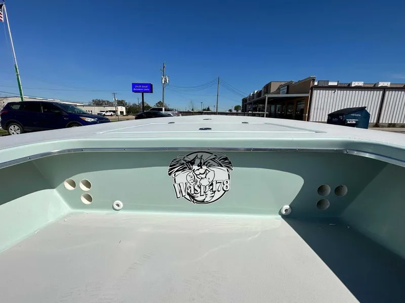 Slide: The Image of B & D Boat Works Wasp 178 Tiller 2026 on parking lot. - 18