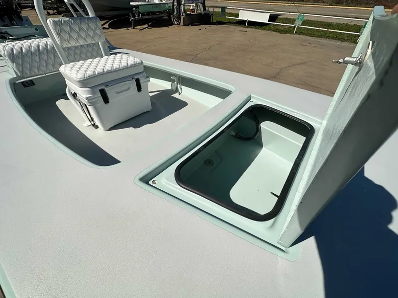 Slide: The Image of B & D Boat Works Wasp 178 Tiller 2026 with open storage compartment. - 19
