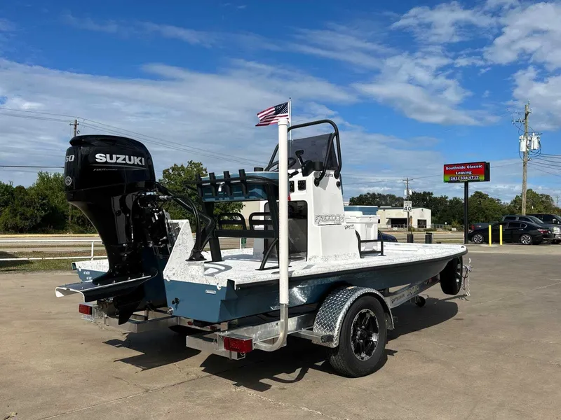 Slide: The Image of Freedom CHIQUITA 2026 boat with Suzuki engine on trailer. - 10