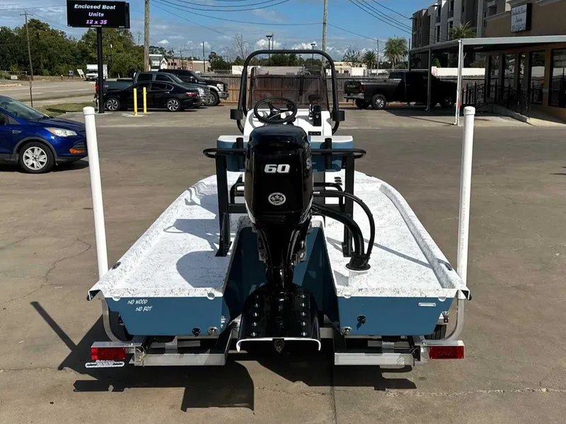 Slide: The Image of Freedom CHIQUITA 2026 boat with 60 HP motor on parking lot. - 4