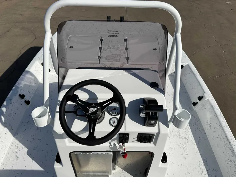 Slide: The Image of Freedom EAGLE boat console, 2026 model, with steering wheel and controls. - 13
