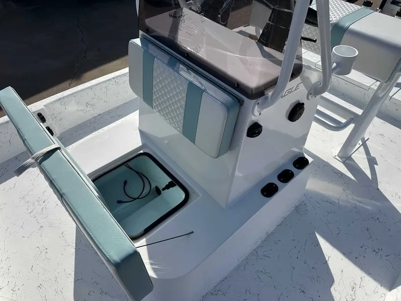 Slide: The Image of Freedom EAGLE 2026 boat console with storage and seat cushion. - 16