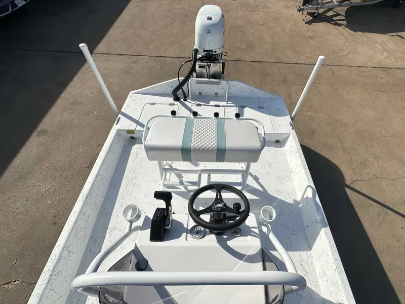 Slide: The Image of 2026 Freedom EAGLE boat with steering console and motor. - 18