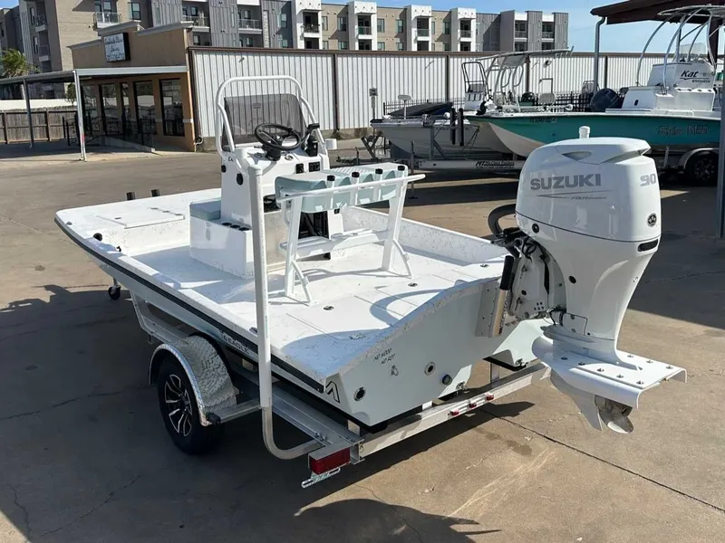 Slide: The Image of 2026 Freedom EAGLE boat with Suzuki 90 HP engine on trailer. - 3