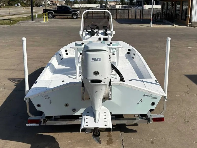 Slide: The Image of Rear view of a Freedom EAGLE boat with outboard motor. - 4