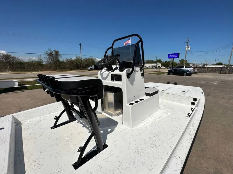 Slide: The Image of Freedom EAGLE 2026 boat with helm and seating area. - 12