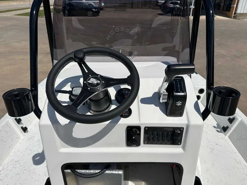 Slide: The Image of Freedom EAGLE 2026 steering console with wheel and controls. - 14
