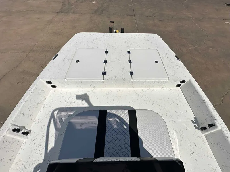 Slide: The Image of 2026 Freedom EAGLE boat deck with storage hatches. - 15