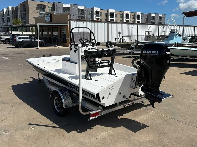 Slide: The Image of Freedom EAGLE 2026 boat with Suzuki 90 engine on trailer. - 3