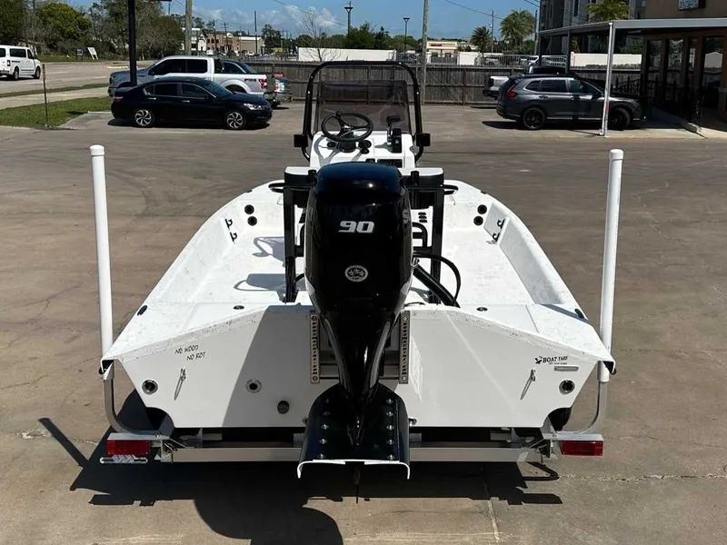 Slide: The Image of Rear view of a Freedom EAGLE 2026 boat with 90 HP engine. - 4