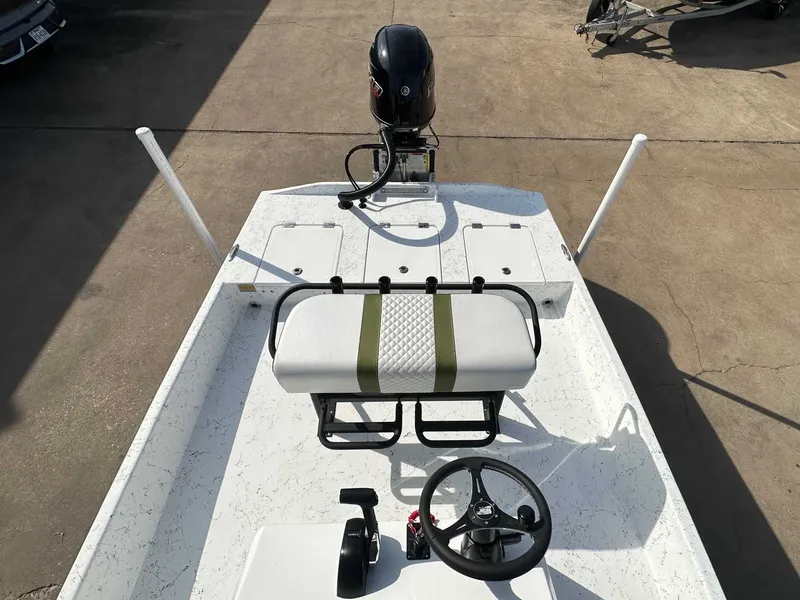 Slide: The Image of 2026 Freedom PATRIOT boat with steering console and bench seat. - 18