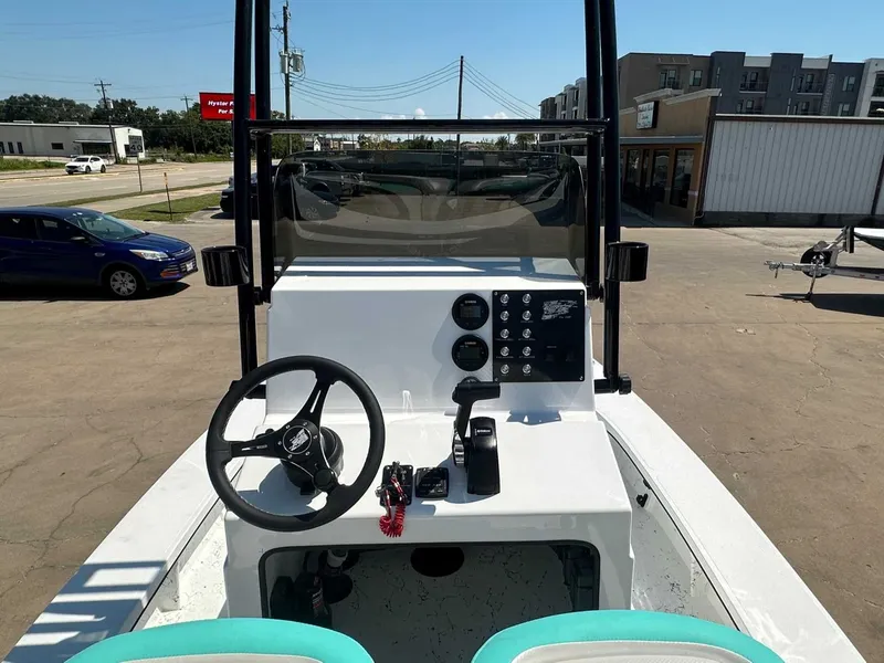 Slide: The Image of Interior view of Freedom Warrior 2026 boat with steering console. - 15