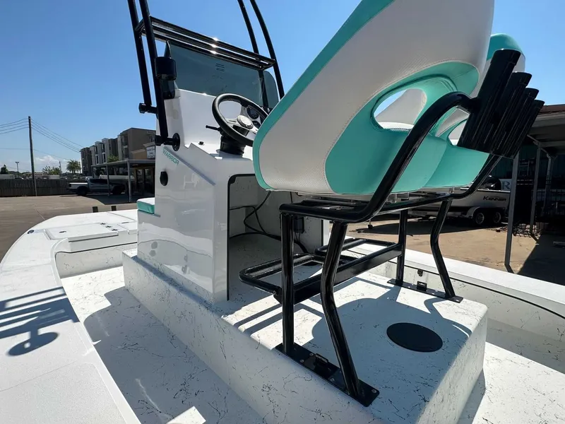 Slide: The Image of 2026 Freedom Warrior boat with modern seating and steering console. - 16