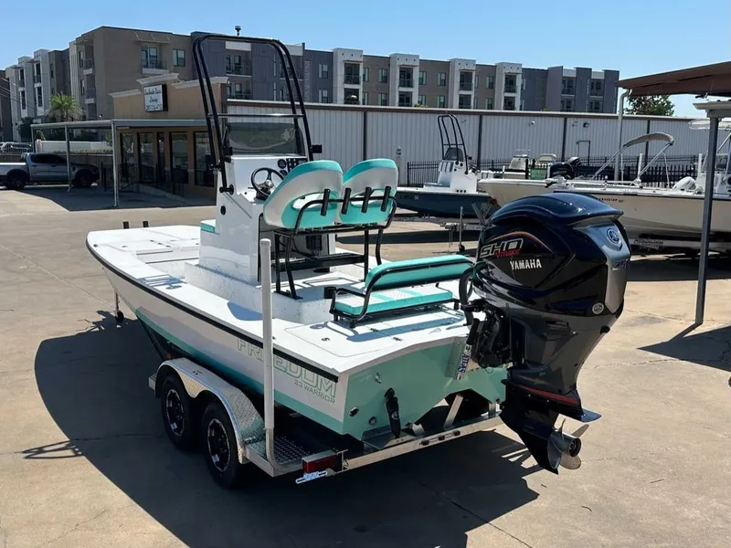 Slide: The Image of 2026 Freedom Warrior boat with Yamaha engine on trailer. - 3